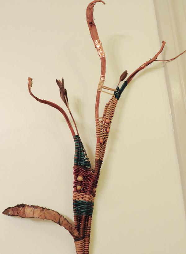 Wall Sculpture with natural reed and marsh treasures.