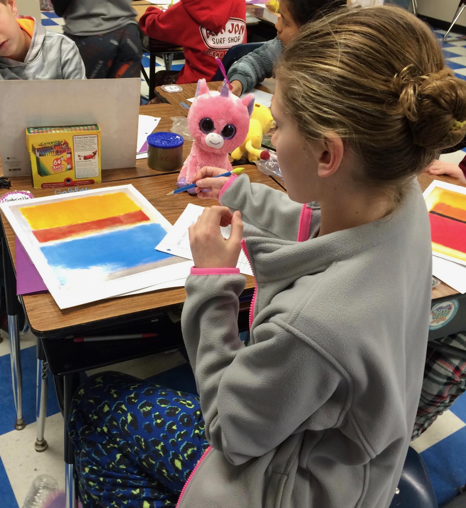 Student working on poem based on Rothko print.