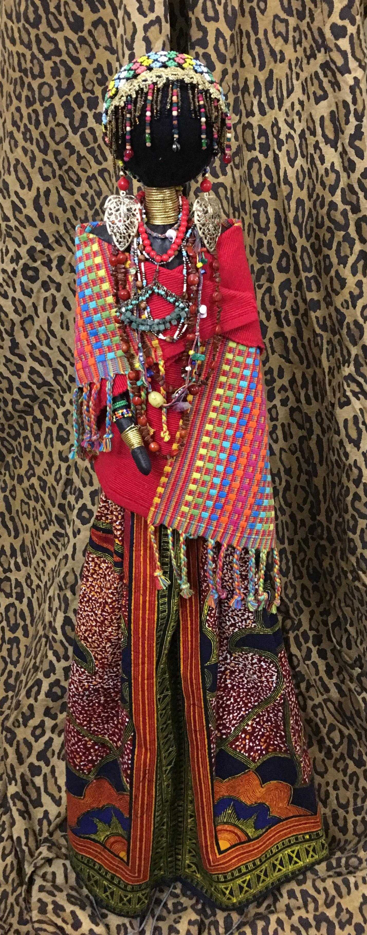 Handmade cloth doll, dressed honor the women of Africa's Maasai tribe. She is about 36 inches tall