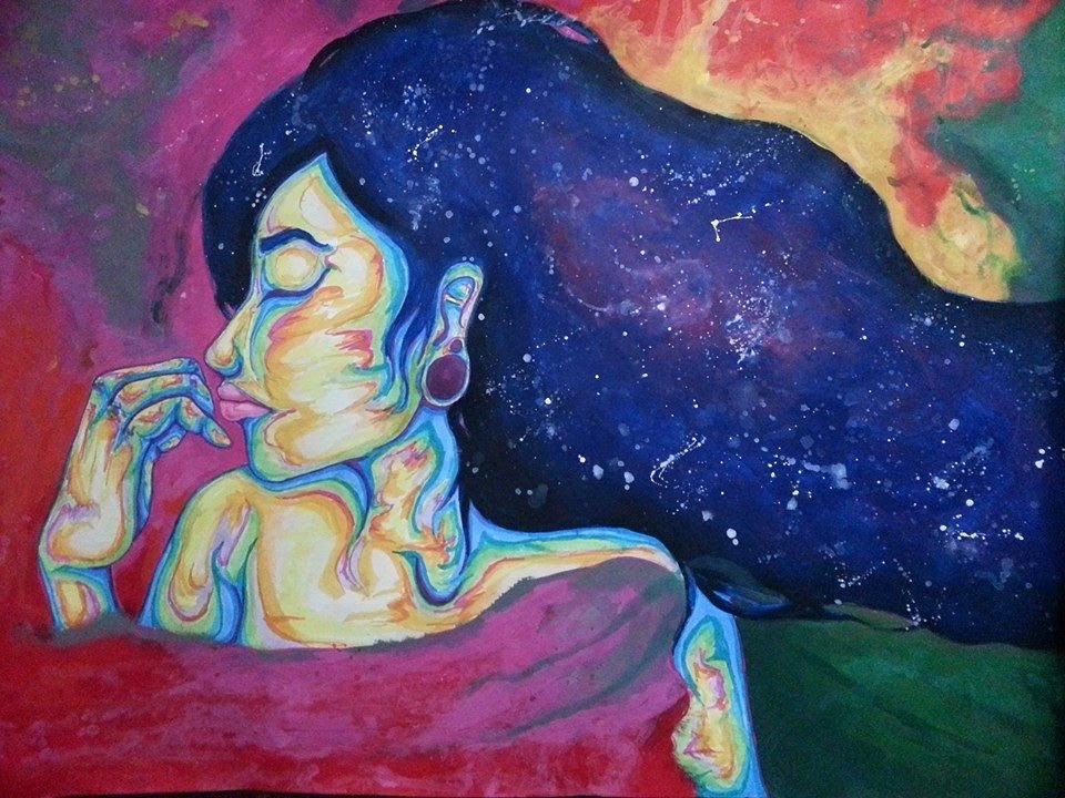 A woman lost in the tranquility of the sky, she blends into the colors of the wind.