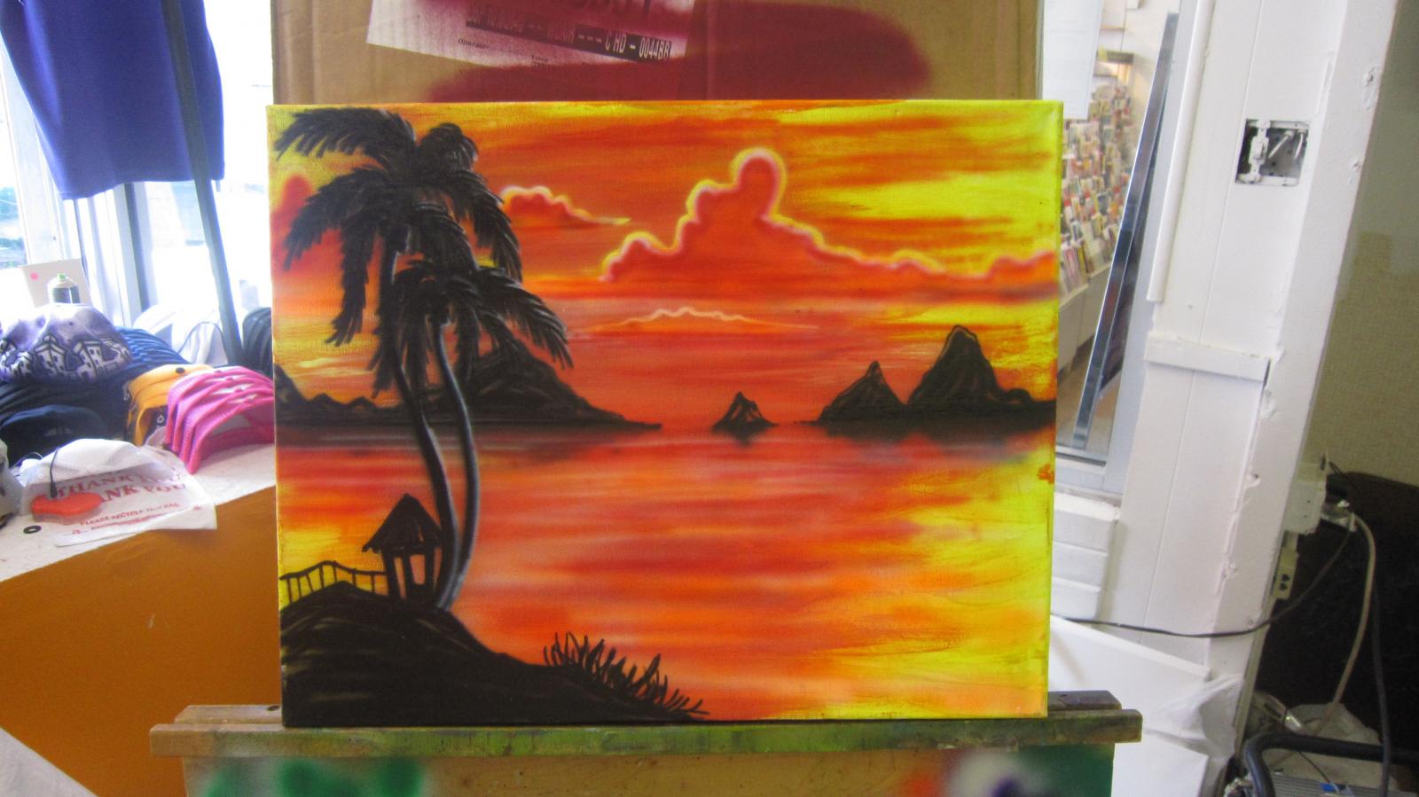 the sunset by the beach, watching the silhouette  of an Island .