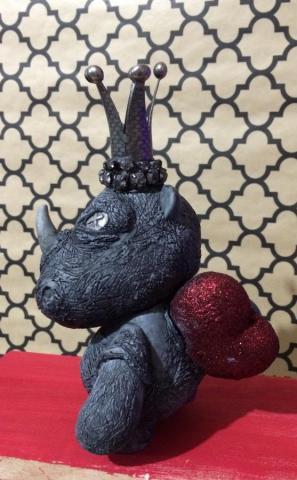 Rhino Sculpture with Heart embedded in his back