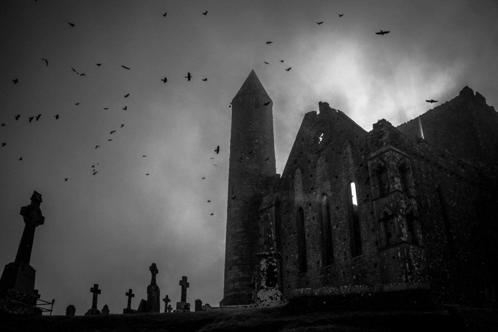 Monochrome image of medieval monastic ruins in central Ireland