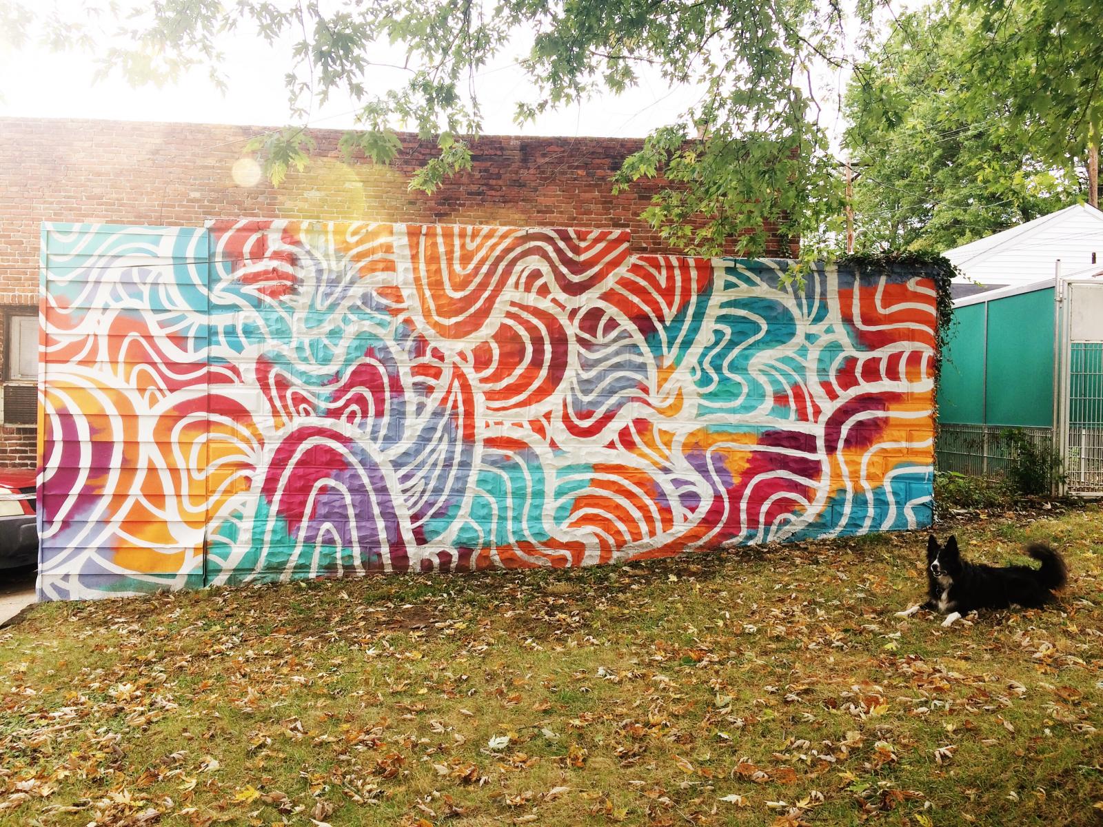 Mural on formstone for Mutt Mart in Northeast Baltimore