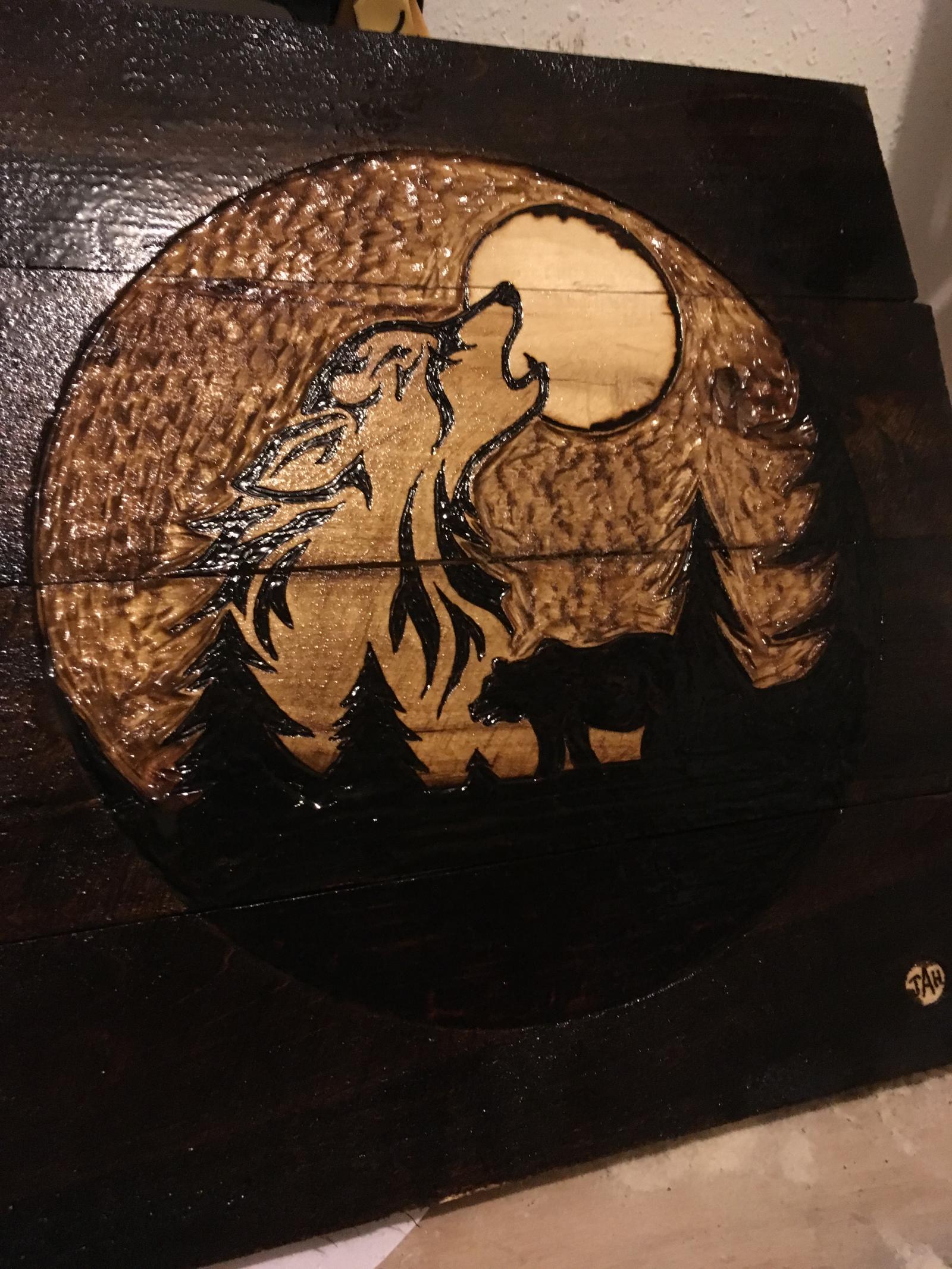 Wolf and bear silhouette wood burned on reclaimed pallet wood