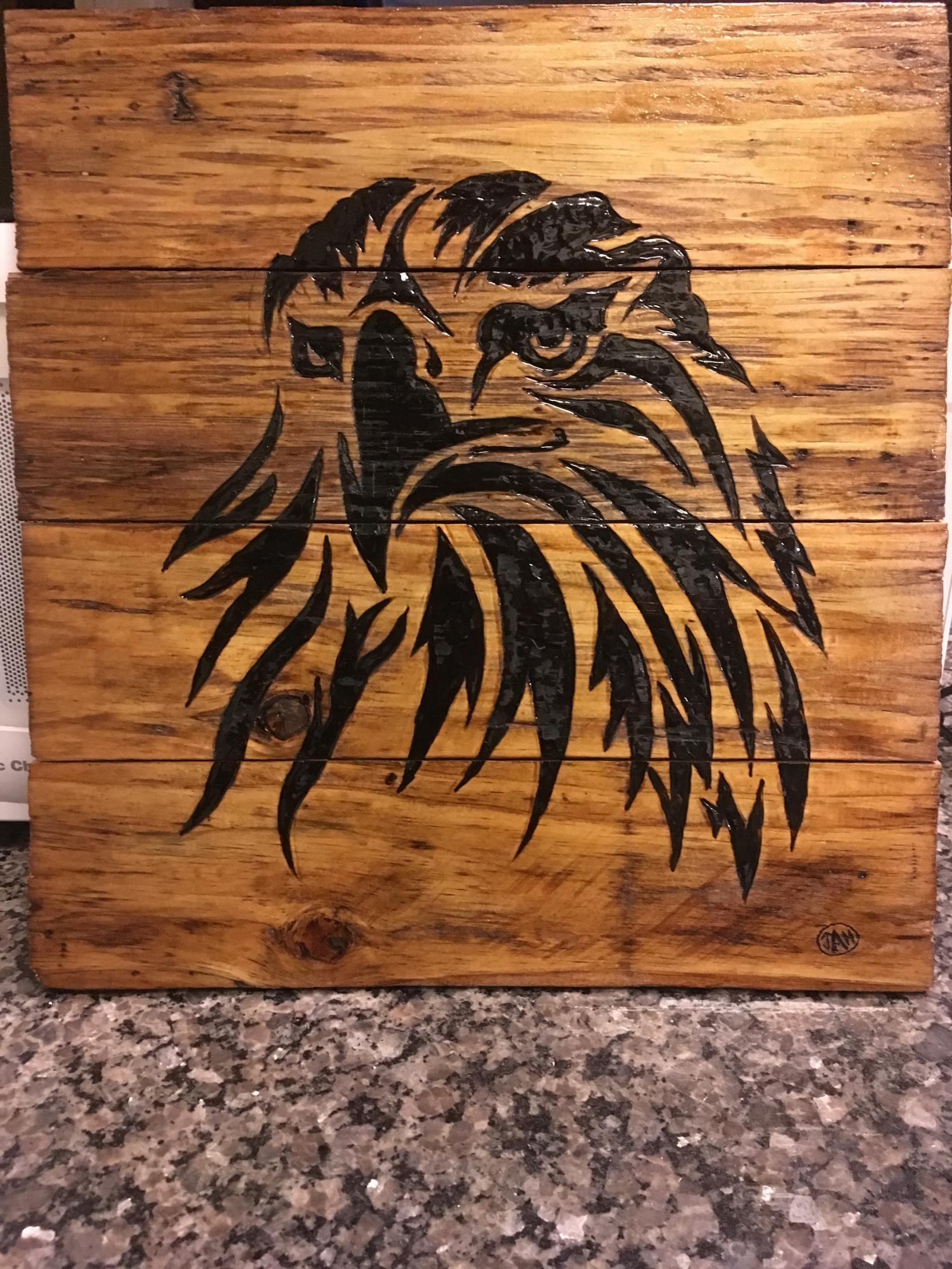 Tribal eagle head wood burned on reclaimed pallet wood