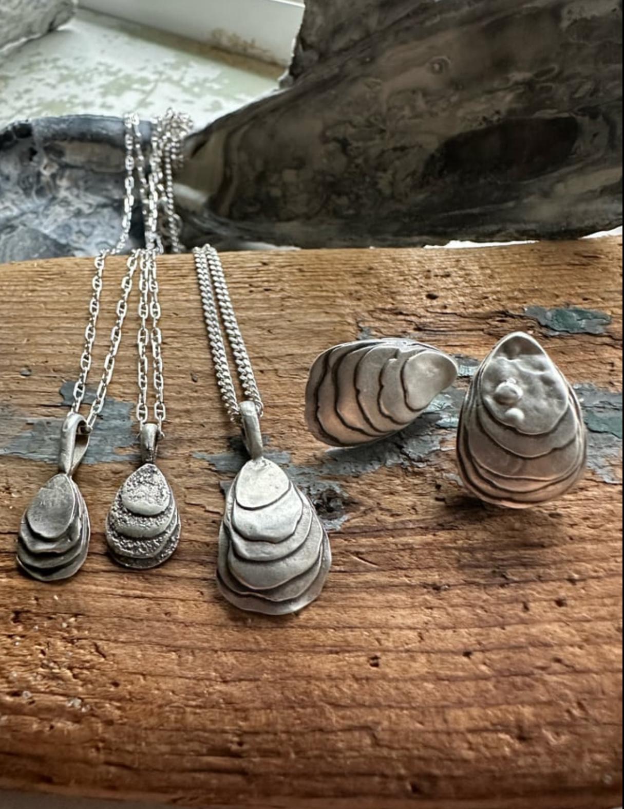 Layer by salty sweet layer each brackish oyster is handcrafted in silver and one of a kind. The oyster is more than just a shell. For some the brackish oyster is a way of life, for others a tradition to gather around when the weather cools.
The mighty oyster has always been there. sustaining and supporting the ecosystem and communities of the Chesapeake.