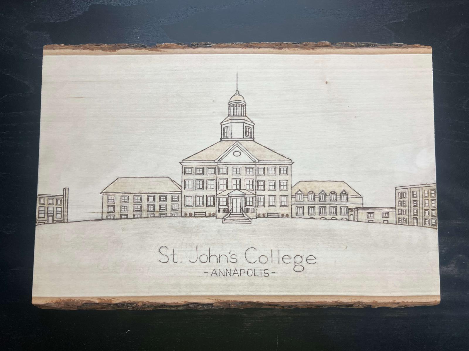 A depiction of St. John’s College in Annapolis burned on basswood.