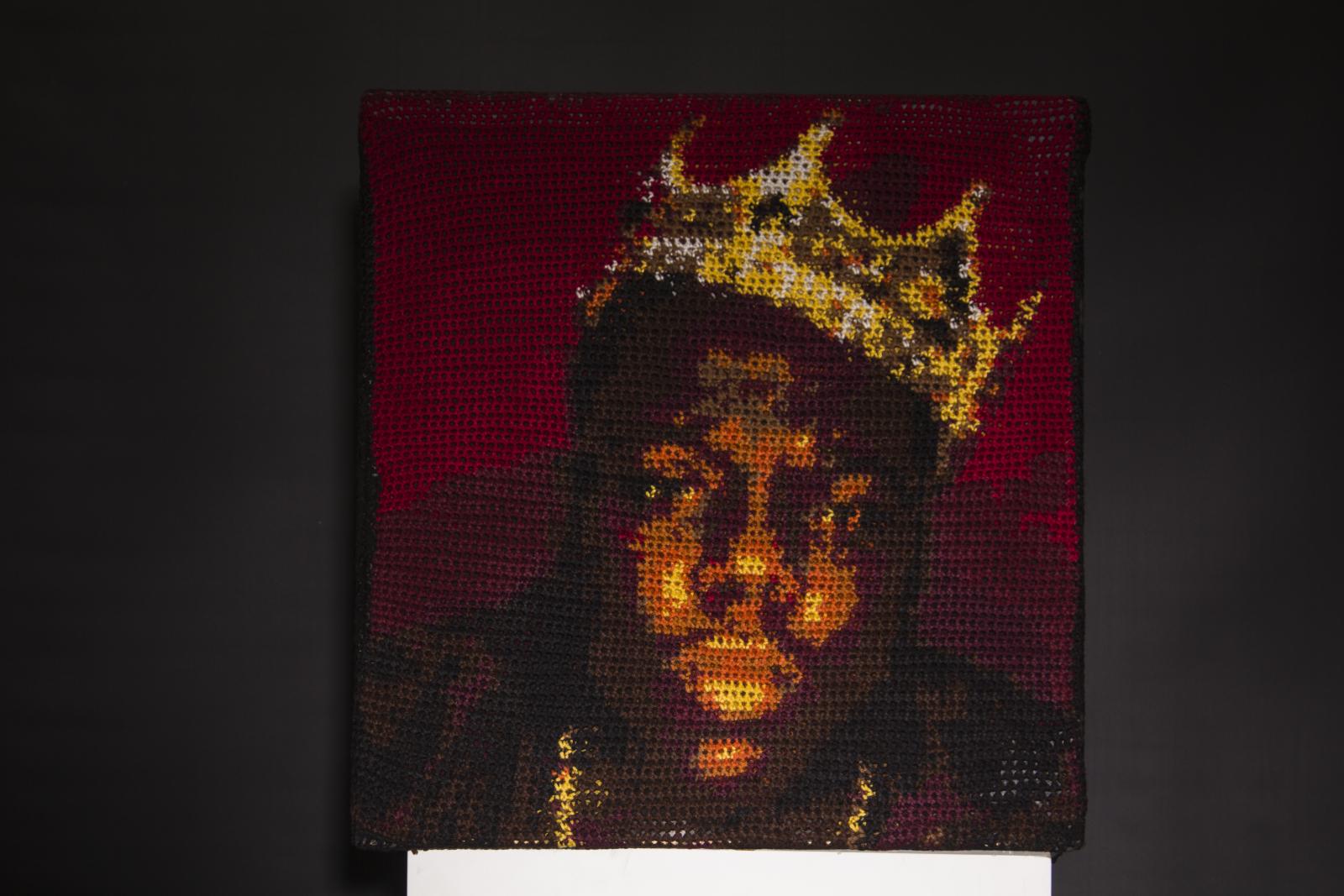 Hand crocheted portrait of the late Christopher Wallace. This portrait is made from wool and acrylic blend yarns in over 10 different colors.