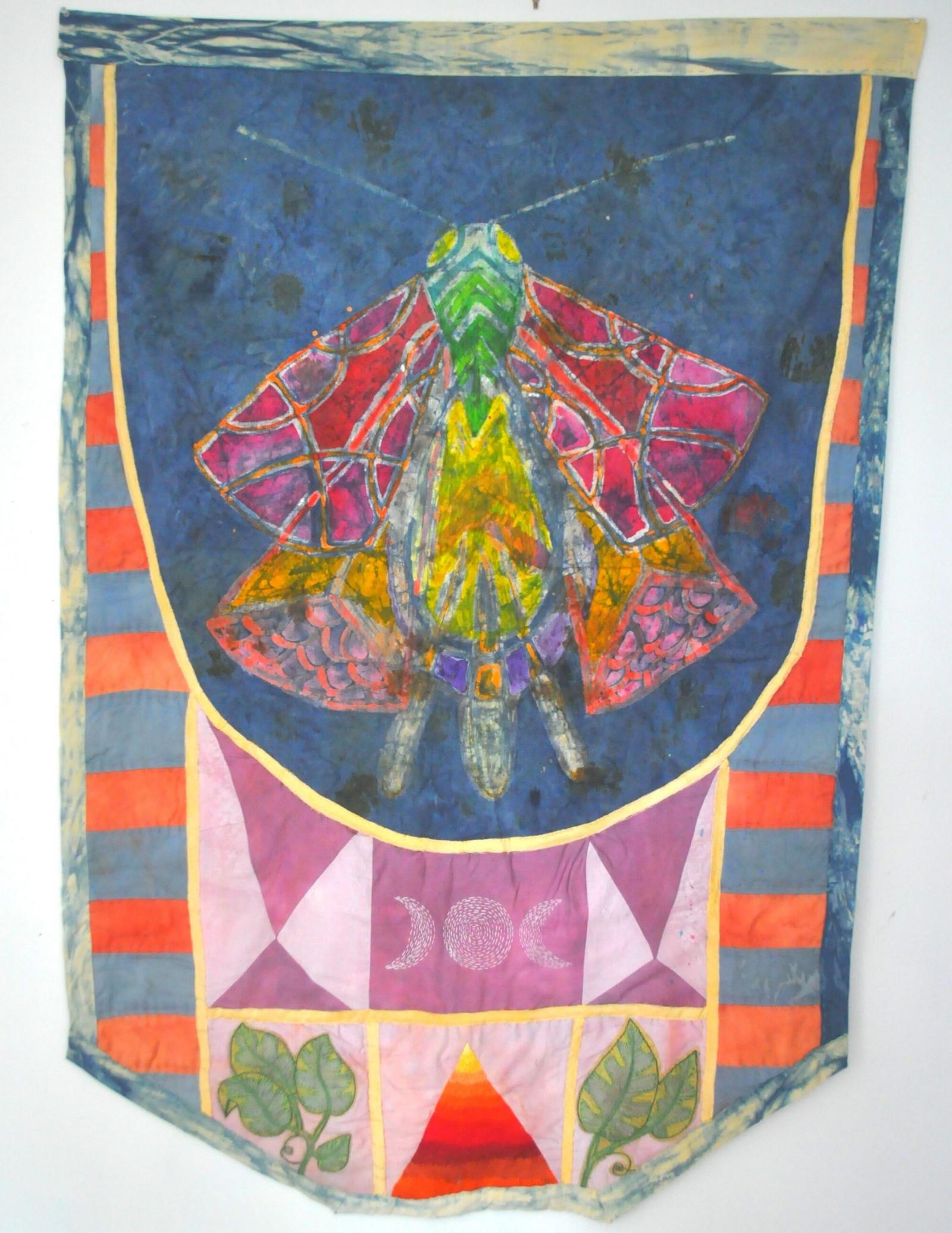 Deep Shadow Walking is a hand-quilted, hand-embroidered, natural dye work that is a more recent direction to my practice. I love working with the concept of banner or flag, a presentation and an announcement of my particular tribe of person. This piece contains symbolism of fireflies, the growth of plants, the lunar cycle, mountains and volcanos as well as the pull from the earth of natural dye.
It is part of a larger installation piece whose fabrication is in progress.
