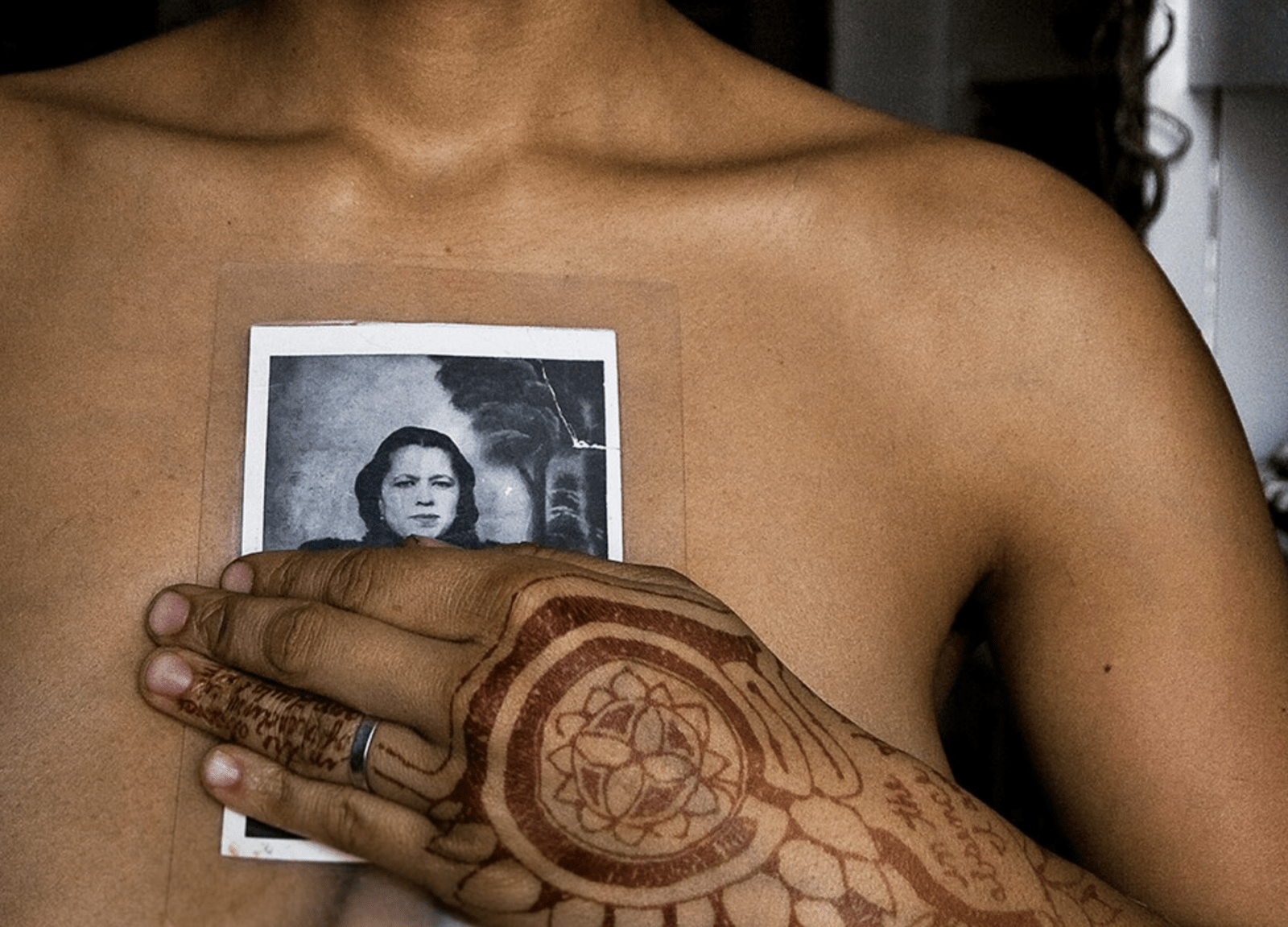 Self Portrait holding a photo of my Great Grandmother, Josephine; from a mixed media series entitled "Free Me, Free Us" exploring healing trans-generational trauma. 

Series includes Various Sized works -- 5 piece series hung salon style. Two 5”X 7” photographs, One 9”X 9” shadow box, One 6”X 9” framed handwritten journal entry (written by my mother in 1999), One 8”X 10” photograph.

