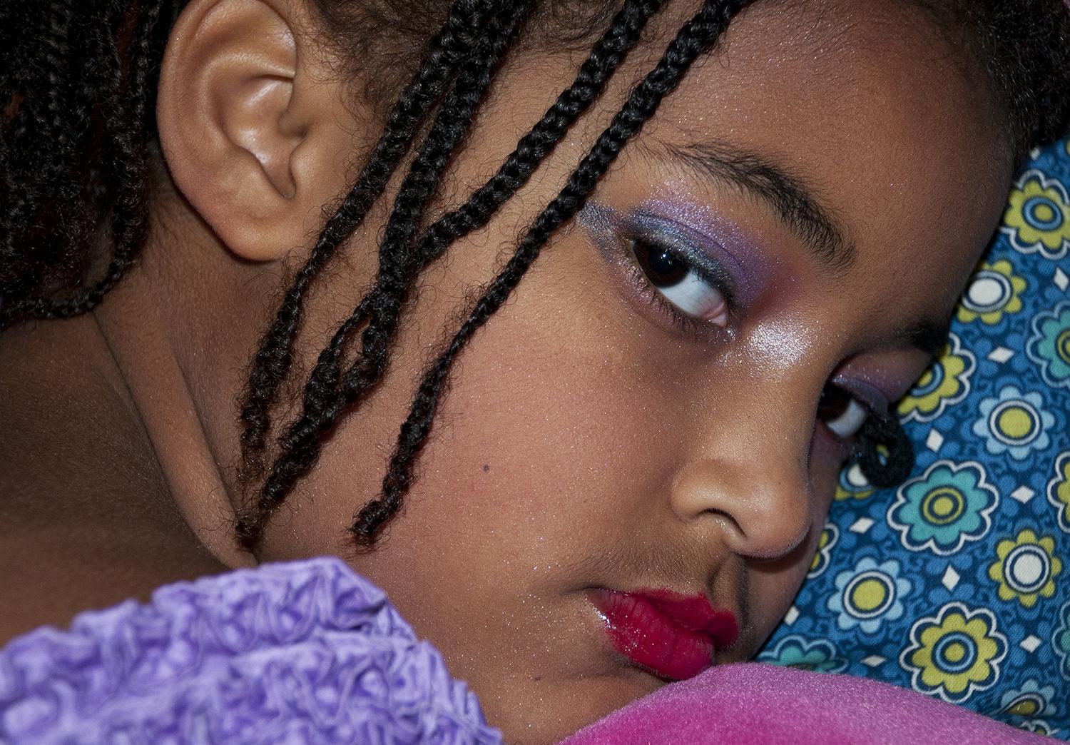 Within the series Adultification of Girls, I seek to question the sexualization of girls by creating a scenario that is heightened by tension, contradiction and confrontation. By contrasting the subject’s vulnerability, femininity and innocence, with their body language, clothing, makeup and gaze, I aim to explore the cultural syndrome of the “adultification” of young girls and question what are they feeling valued for.