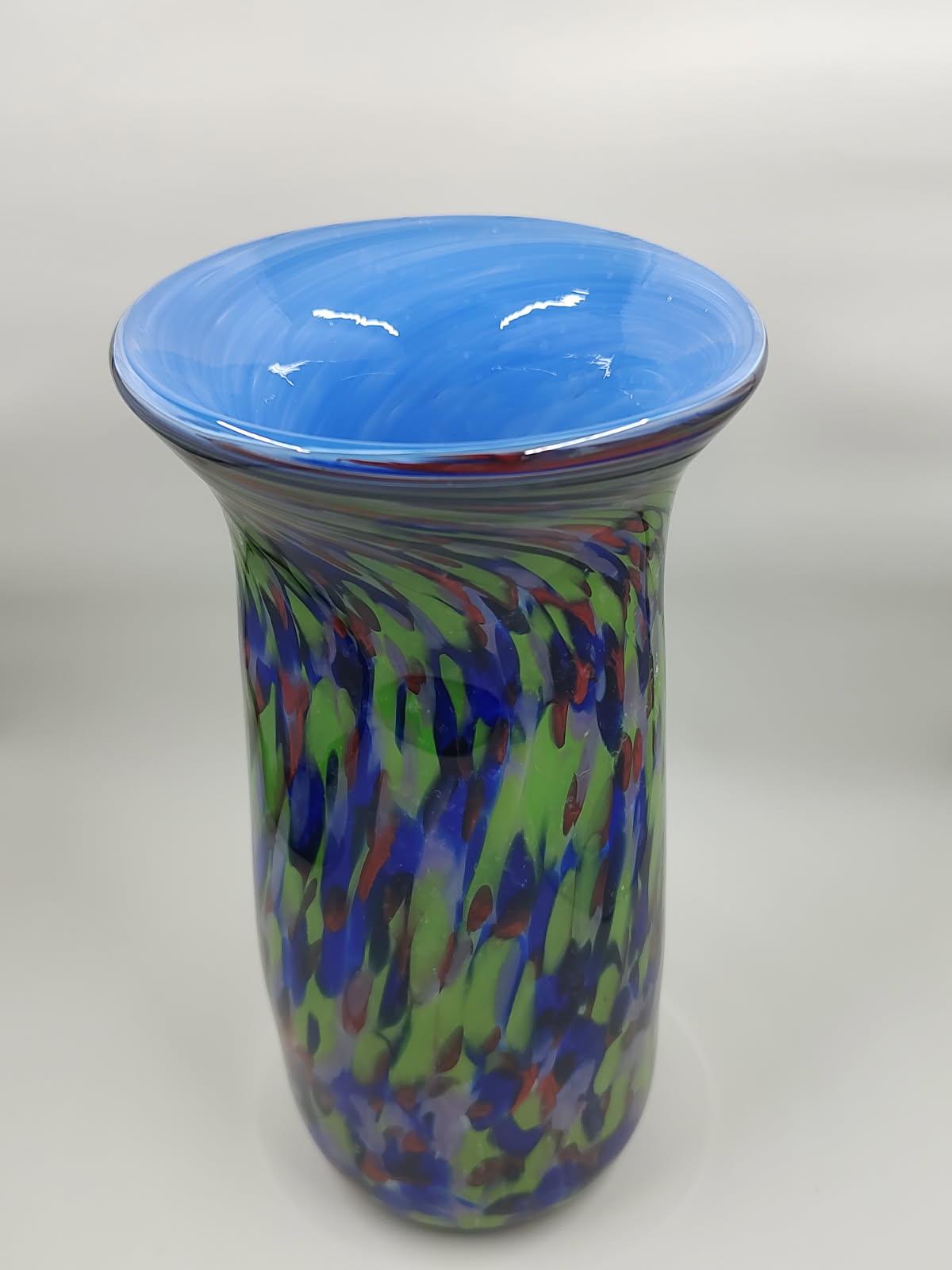 Multi-color glass frit exterior over an aqua blue interior