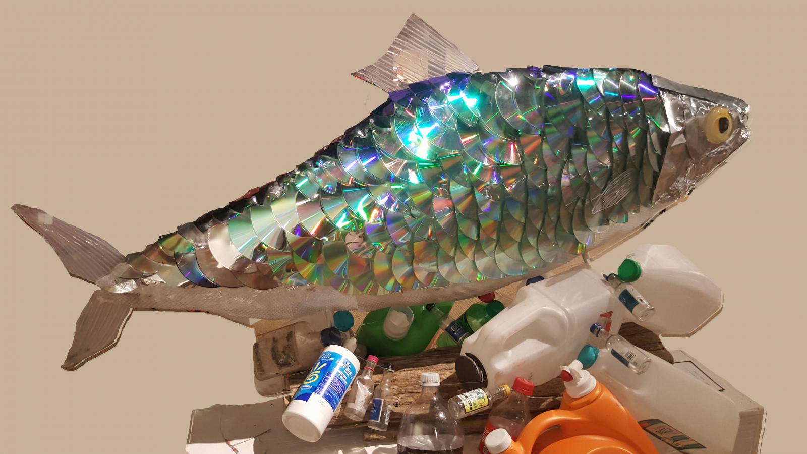 Shaped wood, 150 CDs, foil, collected plastic waste.