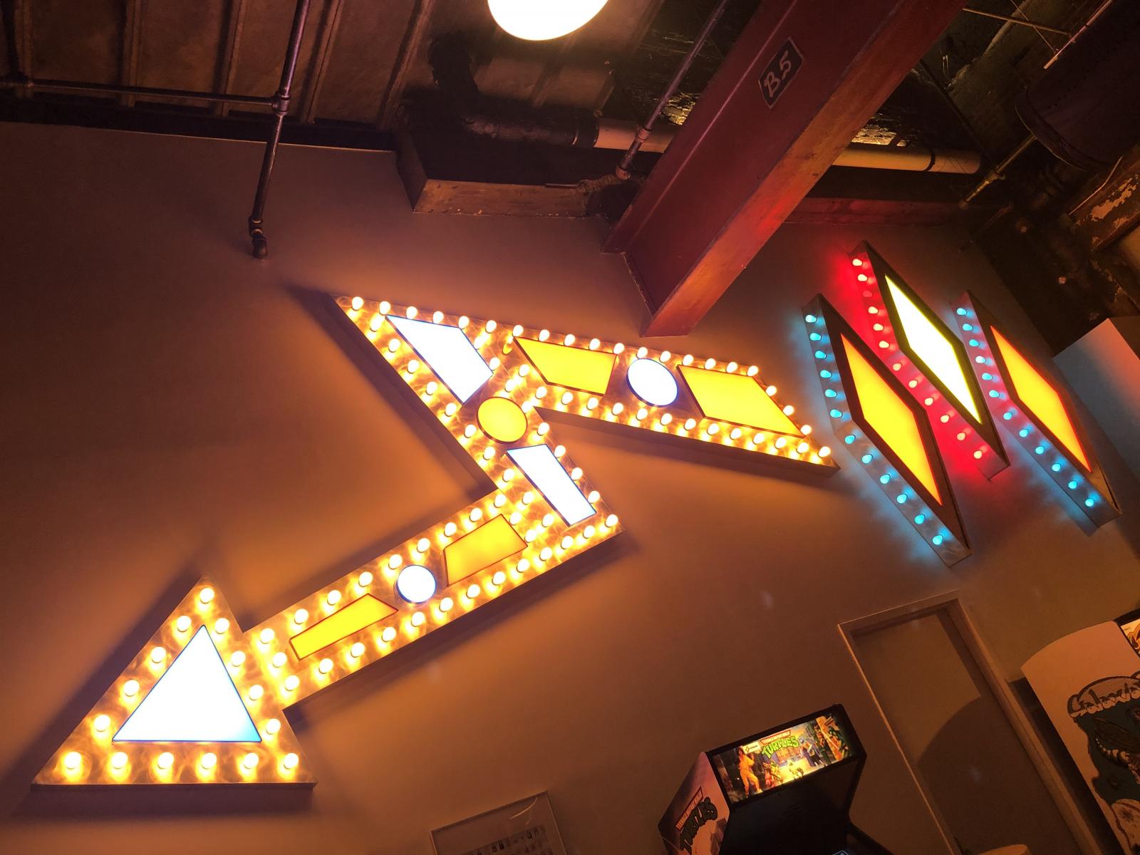  “The Big Arrow” is an installation created for the bar, arcade and music venue in Baltimore City, The North Avenue Market. It adds a retro feel to the vibrant atmosphere of this local establishment.