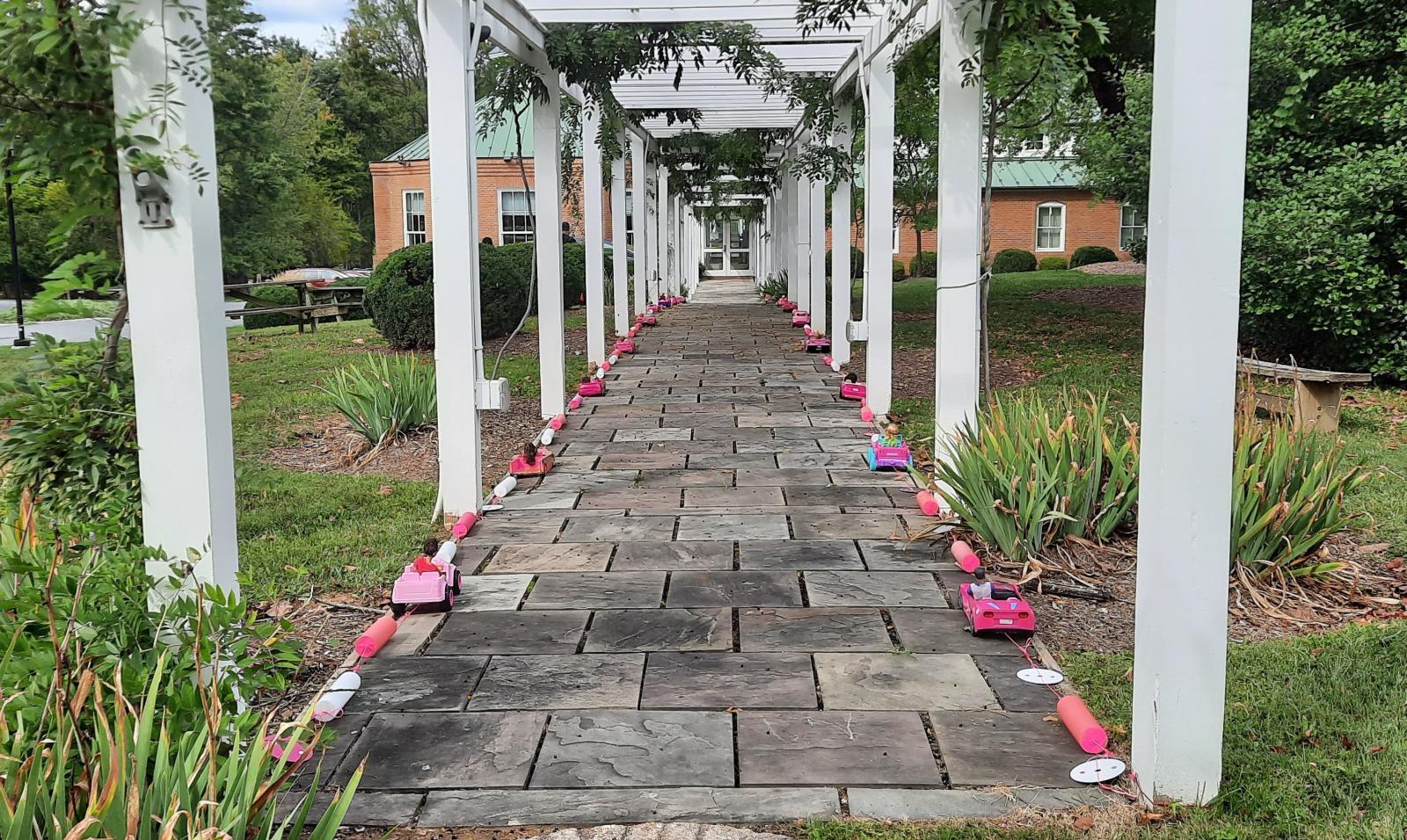 This 100-feet long art work was installed at the Sandy Spring Museum and exhibited outdoors for three months in autumn 2023 as a part of ARTINA organized by the Washington Sculptors Group and curated by Stephanie Mercedes.