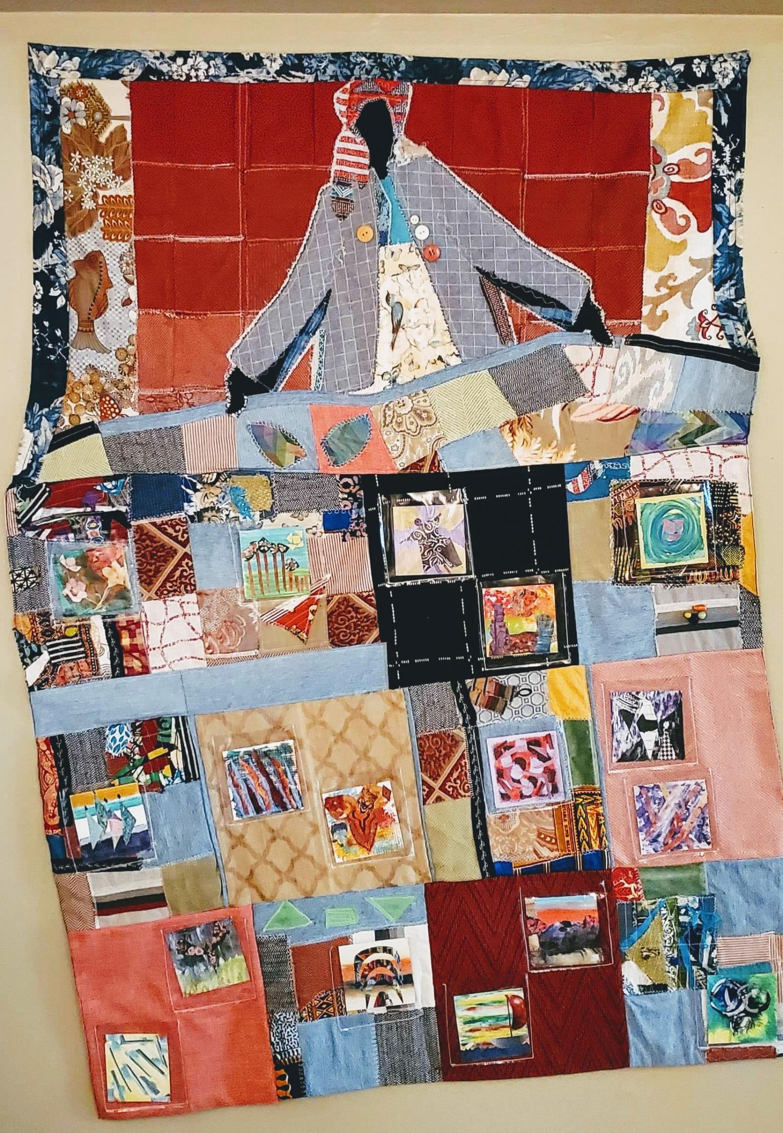 Large quilt like piece with pockets to allow for interchangeable 4x4 mini collages to be incorporated in the overall image.  This was a collaboration with the IWWC Interfaith Women's Work Center in Rockville MD that included some staff and residents. 