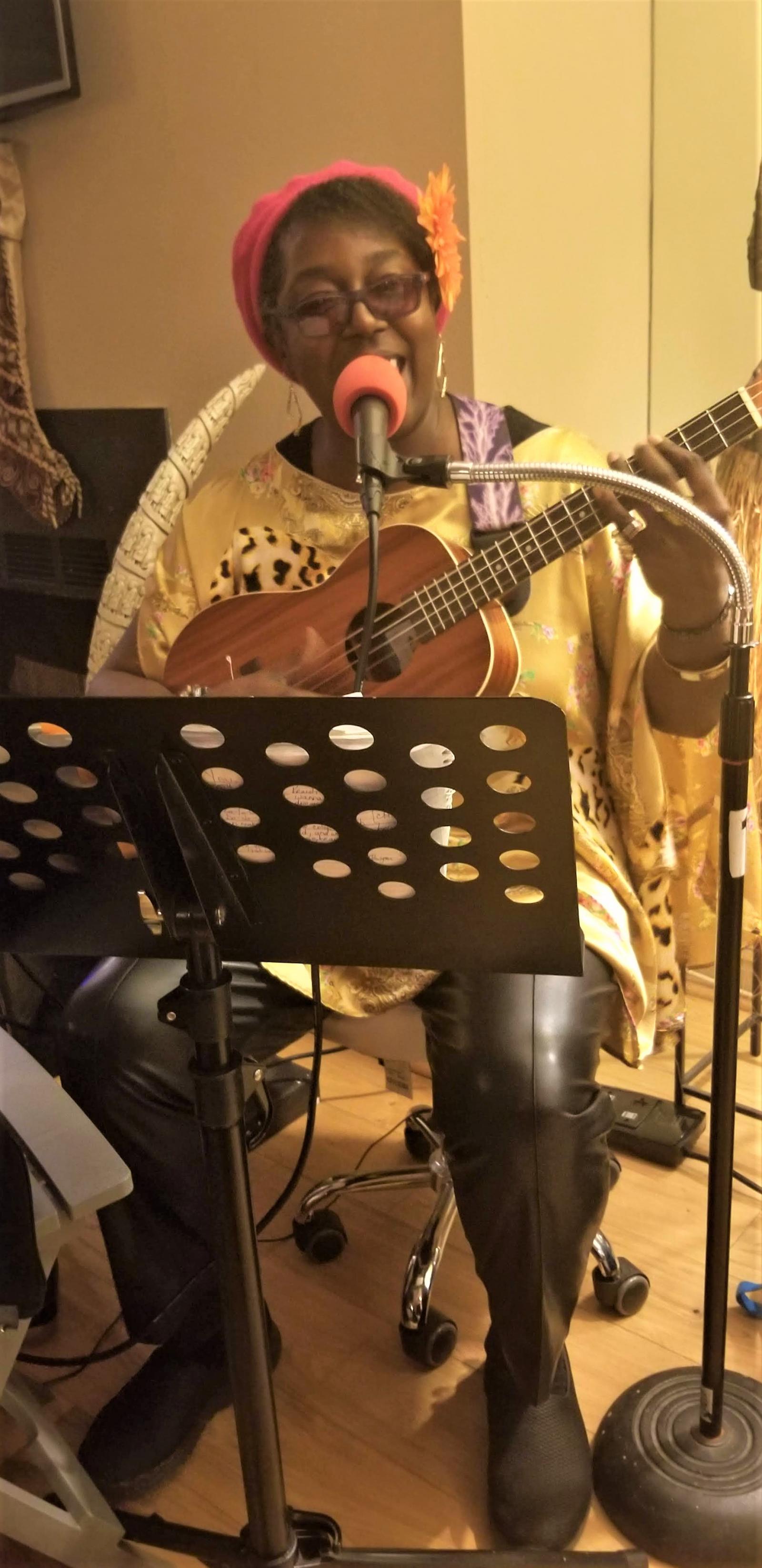 REGINA EARL ON UKULELE - PRIVATE ENGAGEMENT - HOSTED AT A CLIENT IN ROLAND PARK, BALTIMORE - PROVIDED A 20-30 MINUTE MUSICAL PERFORMANCE OF ORIGINALS, JAZZ STANDARDS AND CUSTOM R&B-POP-BLUES ARRANGEMENTS FOR AN INTIMATE PARTY OF 5 GUESTS.