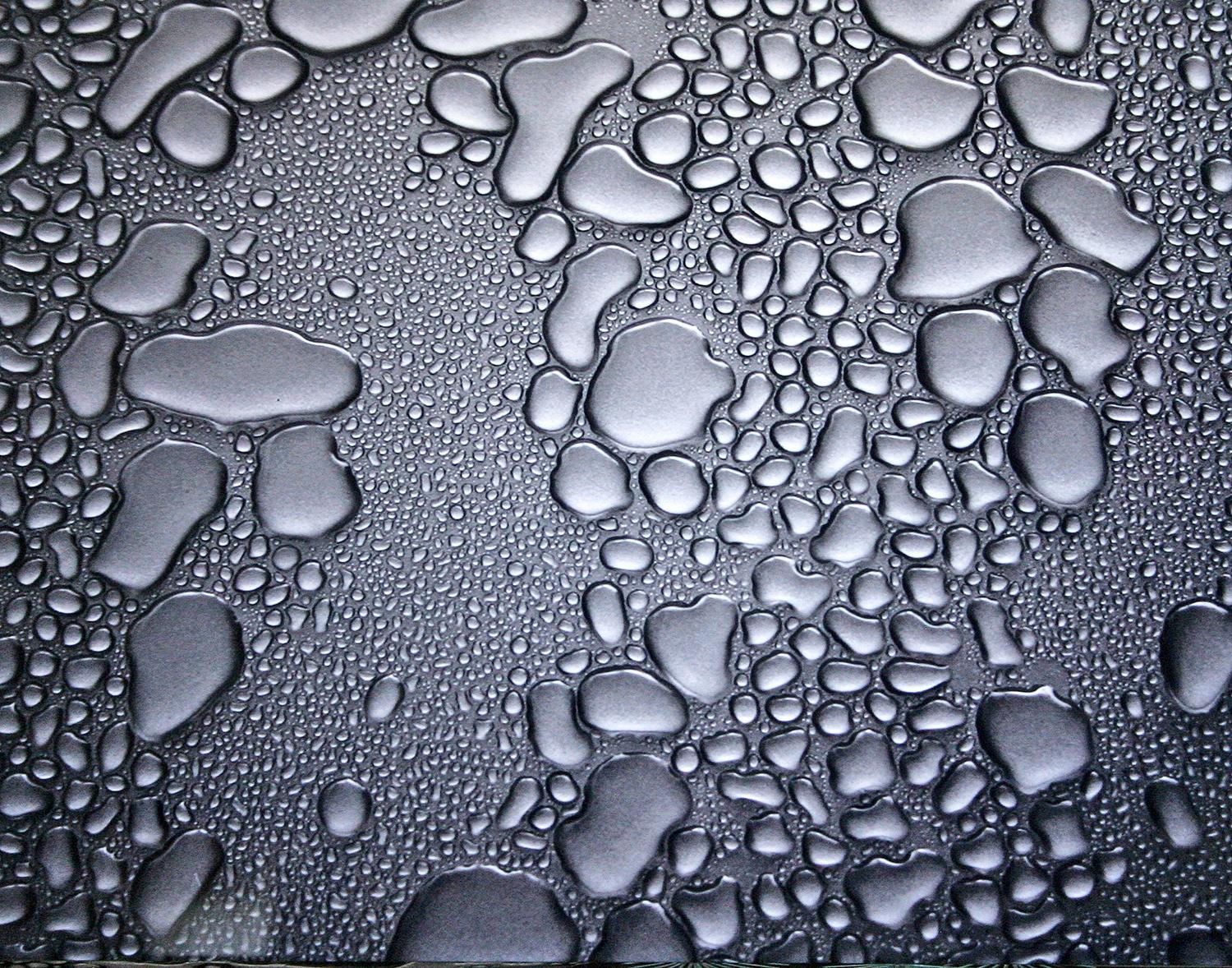 Digital Capture of rain droplets on my silver Honda