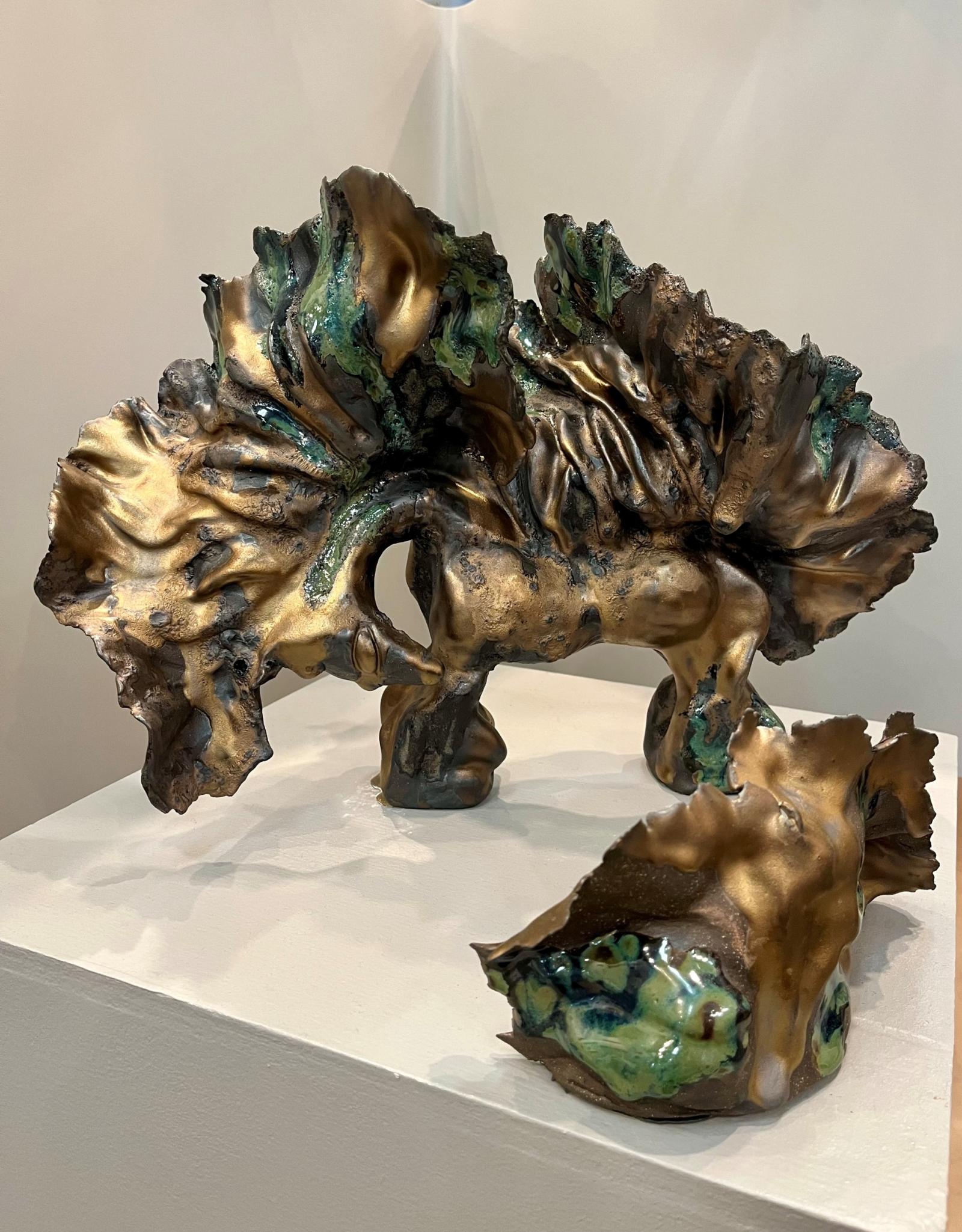 This ceramic sculpture depicts a horse racing toward an unknown future, its four hooves pounding with determination. It carries the understanding that true limits are self-made, refusing to recognize any boundaries—neither of geography nor of emotion. Bold and fearless, it embodies humanity itself: courageous, boundary-defying, unafraid of what lies ahead, and always open to innovation and action. The glazes used give the piece a metallic sheen, symbolizing a wild harmony between earth and metal, a striking fusion that reflects both strength and untamed beauty. This work captures the spirit of freedom and unstoppable drive, inspiring viewers to embrace their own potential.