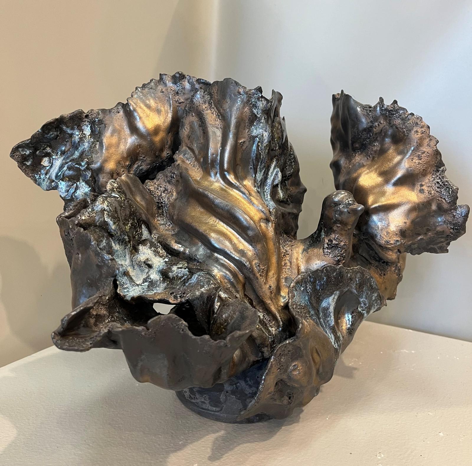 This piece is one of those works that refuses to fit any mold in form or structure, yet knows no boundaries in its emotional expression. Despite the fragility of the clay, I carefully nurtured it until it achieved a visual integrity that feels solid and complete. Like a living metaphor, it draws the viewer in, leading them on an emotional journey. From different angles, it reveals new sensations, unexpected stories, and subtle shifts of feeling—inviting each person to discover their own narrative within the work.