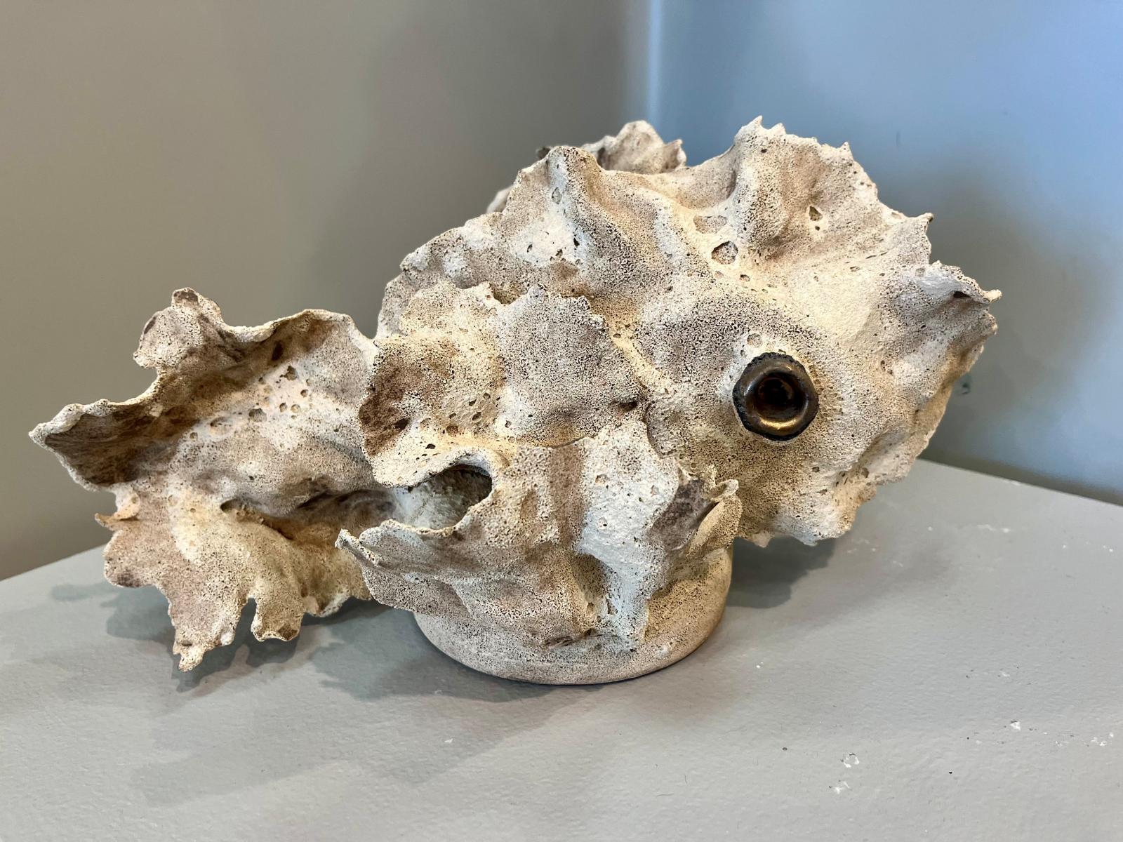 This work depicts a creature that has evolved among the corals, fully integrated into its underwater world. Yet, it longs to be somewhere else, dreaming of a different place. It must adapt to the challenges of its current environment, learning to survive while pushing toward its desired destination. The creature struggles bravely, never giving up, constantly striving for something better. This piece carries the essence of perseverance—a story of courage, resilience, and the relentless pursuit of growth.