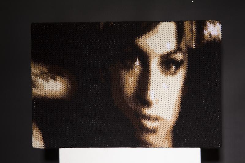 Hand Crocheted portrait of the late Amy Winehouse. The piece is constructed with wool and acrylic fibers.