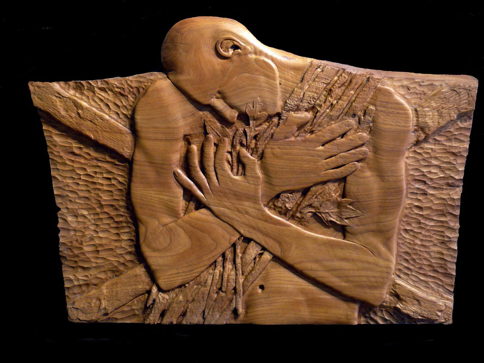 Carved butternut wood, depicting connection to nature