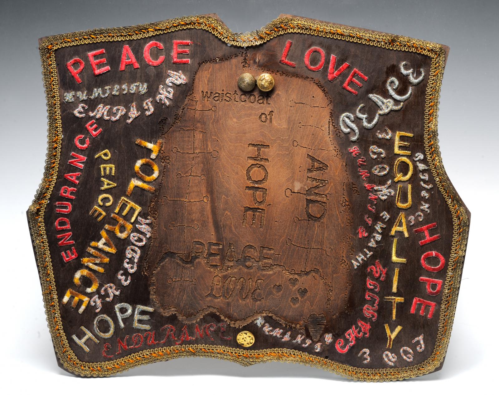 A residency at VisArts, Rockville, was the inspiration of this work. The collection at the former slave owner's
house, now the Montgomery Historical Society, resulted in this contemporary piece. The work is laser cut on
wood using traditional embroidery skills with text using the sewing computer. Antique accessories are used
in the work in conjunction with the text (created with the laser).
 The message symbolizes Hope and Peace.