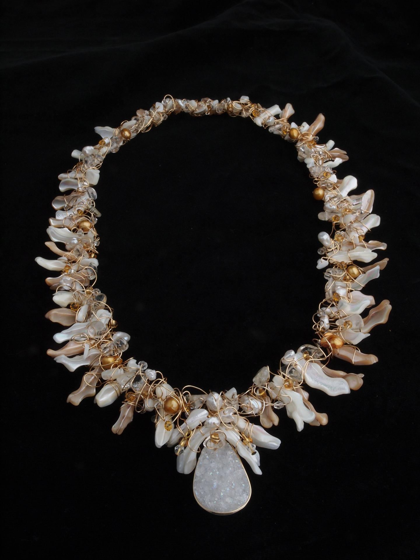 Gold wire sculpted necklace combing mollusk shell pieces and pearls with swarovski crystals and beads, custom design for bride for Hawaiian wedding.