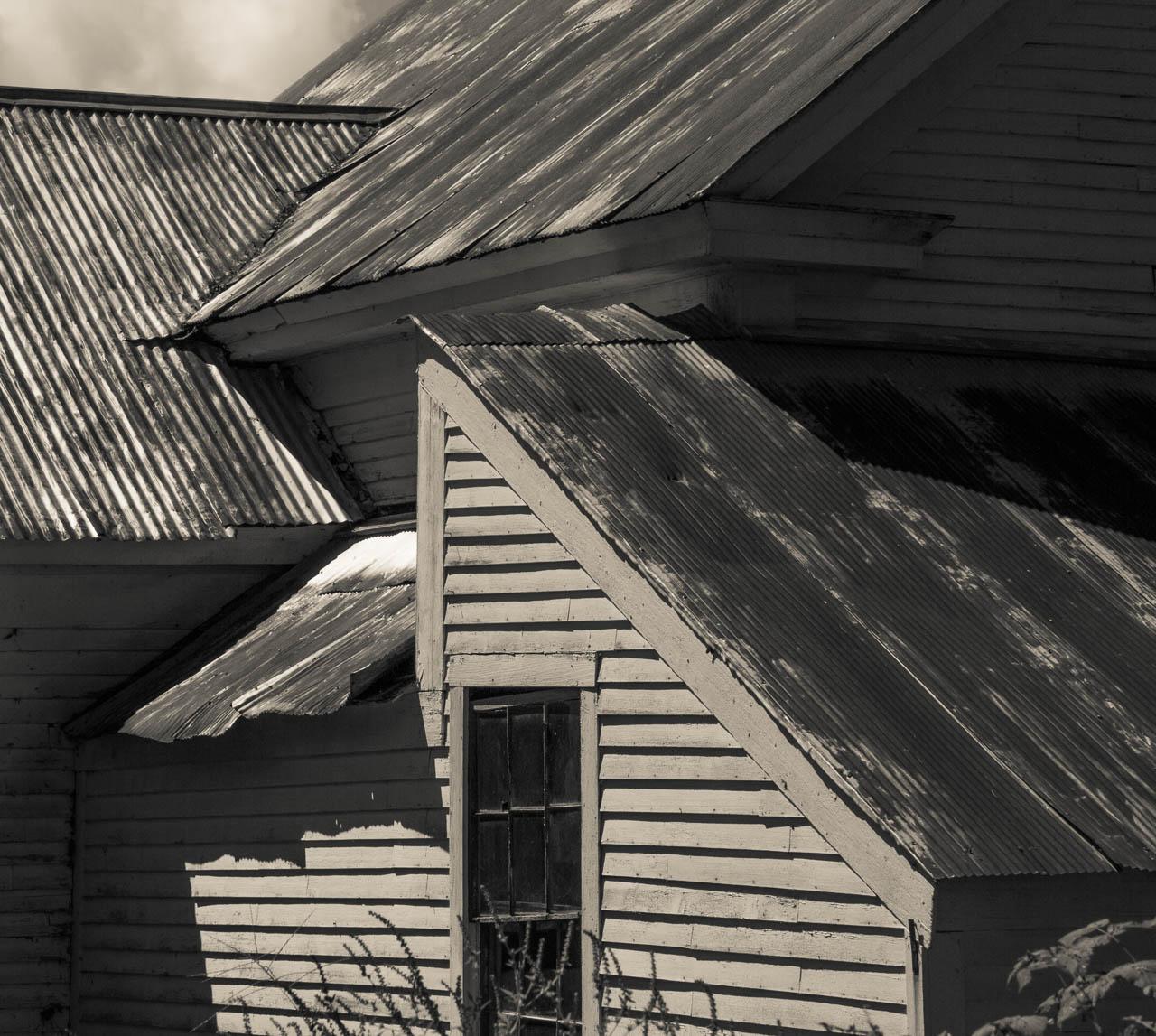 Vernacular New England grows by accretions of building sections.  Somehow the geometry  becomes more complex, but remains cohesive.