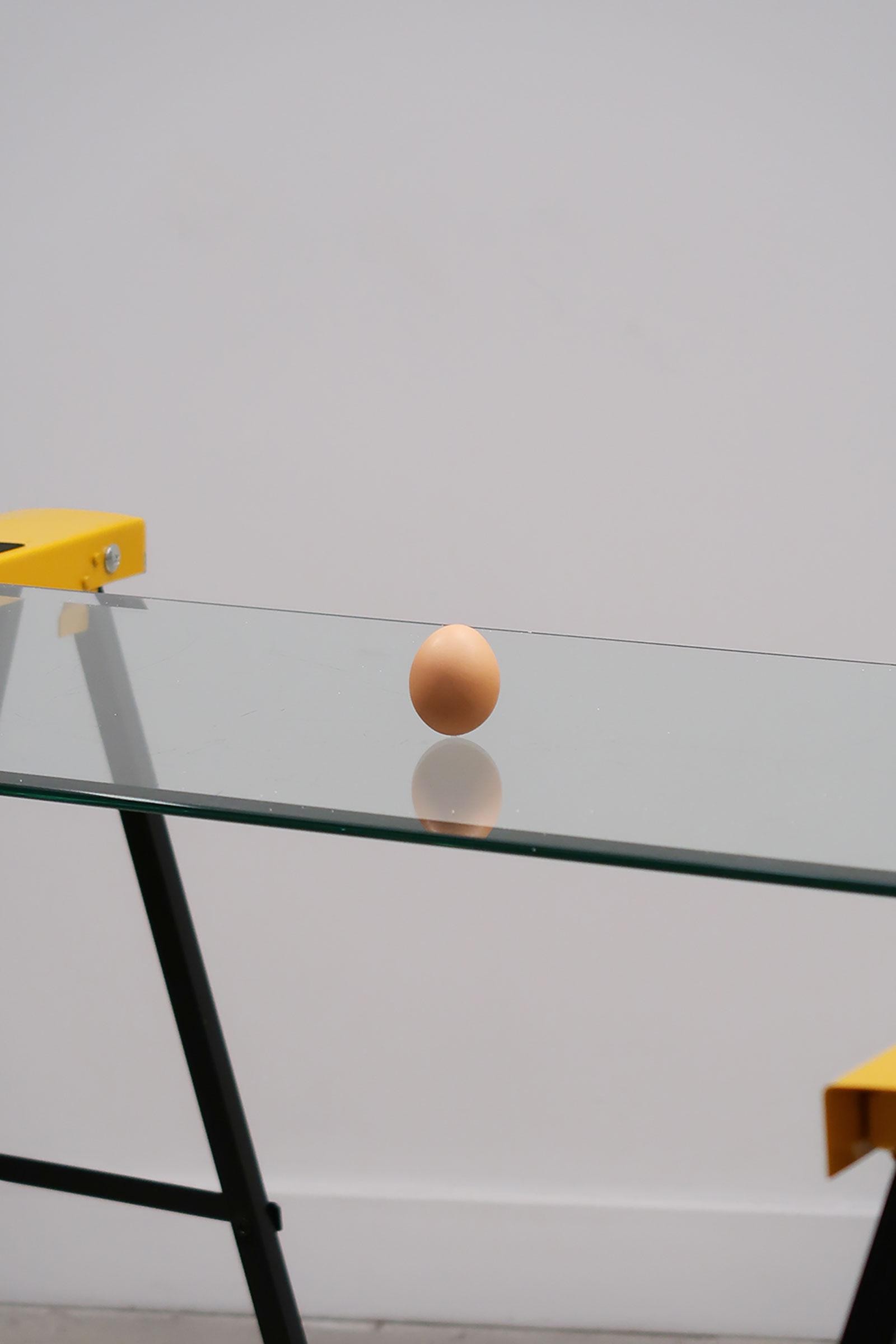*The eggs are standing on the glass(and very small amount of the salt is holding the balance of the egg.)
