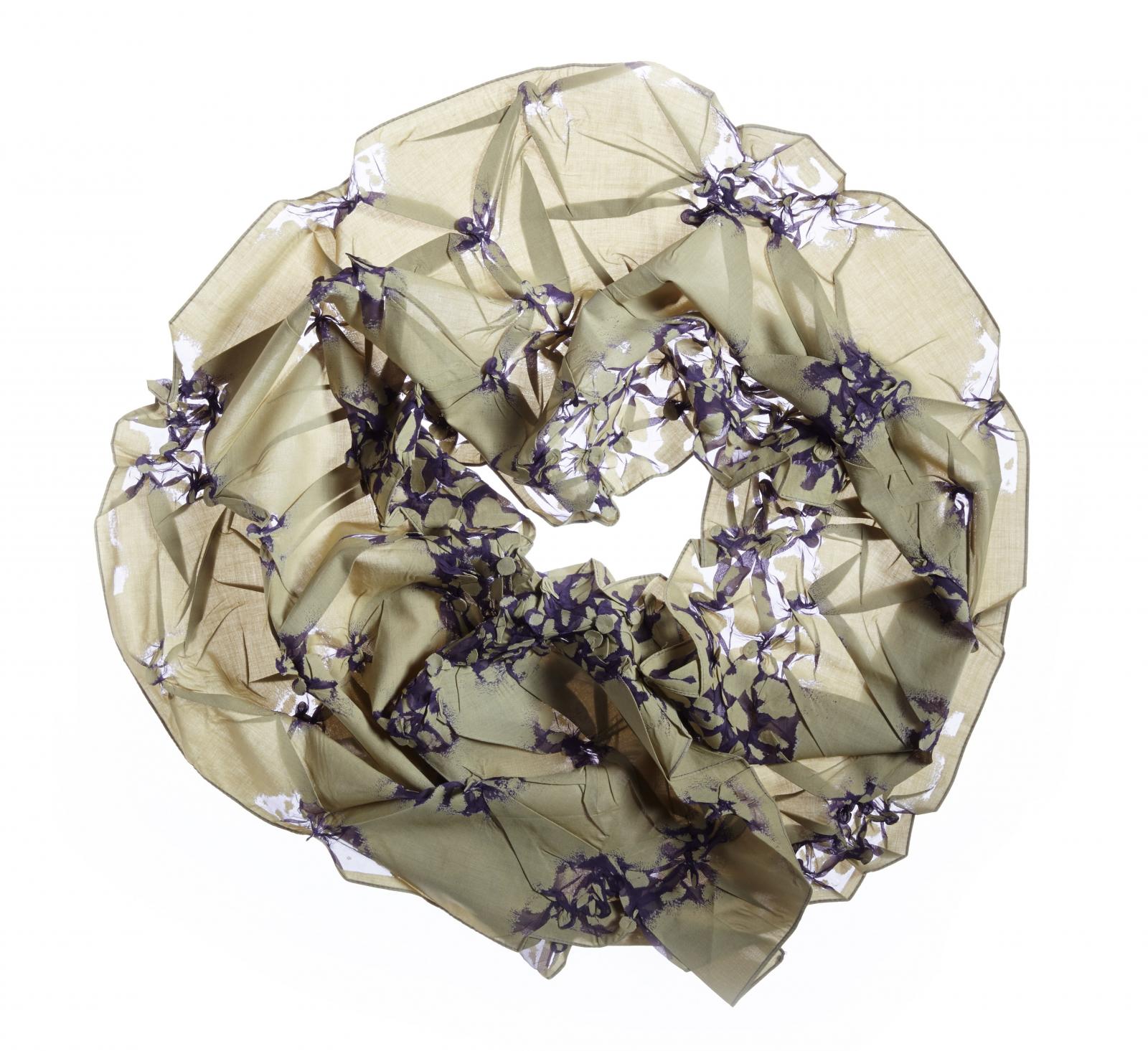 The vibrant petals look like they have been scattered by the wind, and the fabric's cotton-polyester blend and hand-pleated design accentuate this movement. The two-toned dye and devoré painting technique create semi-transparent petals, with the fabric surging into life like a tree that has been awaiting spring all winter long and finally blossoms in the warm air. The petals drift down, and the fabric is like a soft hand ready to hold onto the beautiful and ethereal energy of spring. Wearable in art.