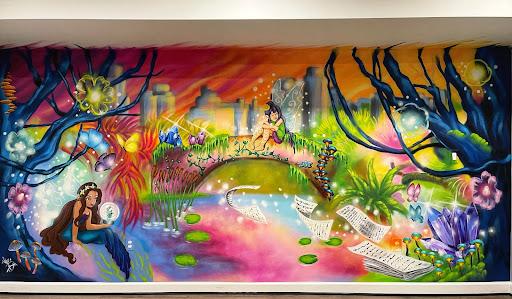 Date: 6/2/2021:
Title: Central Park Fairytale Portal
Size: 8ft x 11ft
Address: Playroom Private Residence ( Waterford , VA)
Commission by: Private
Cost: $8k
Description: The enchanting mural titled "Central Park Fairytale Portal" was meticulously brought to life at a private residence in Waterford, VA. The primary objective of this artwork was to depict Central Park, NY as though it existed within a captivating fairy tale realm. Specifically designed for a 12-year-old girl's playroom, the mural presents a breathtaking landscape adorned with the presence of two mesmerizing fairies and an aura of enchantment throughout. Adding a personal touch, the mural incorporates music sheets gracefully floating in the wind, showcasing the young girl's favorite song. This whimsical creation serves as a gateway to an imaginative world, igniting the imagination and bringing joy to the girl's playroom.
