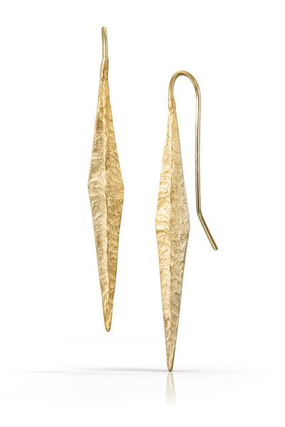 These statement earrings feature fixed french hooks and a delicately textured surface that mimics a rocky ridge.