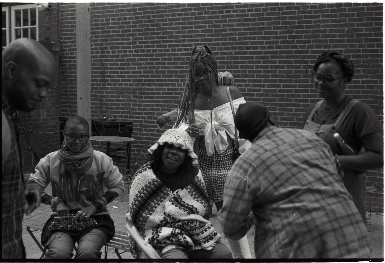 image is of a local gathering of black artist and community workers. 