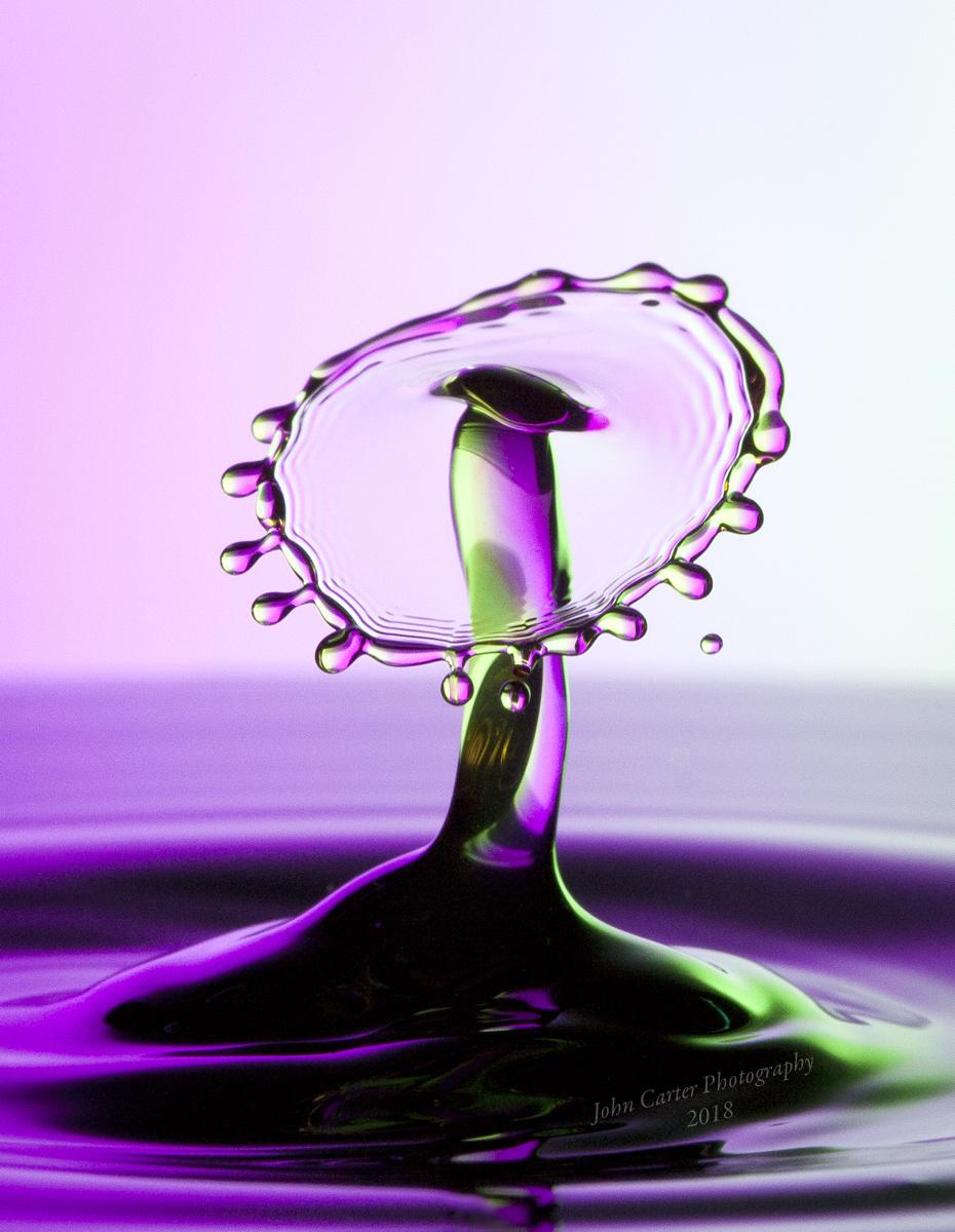 Two water drops colliding