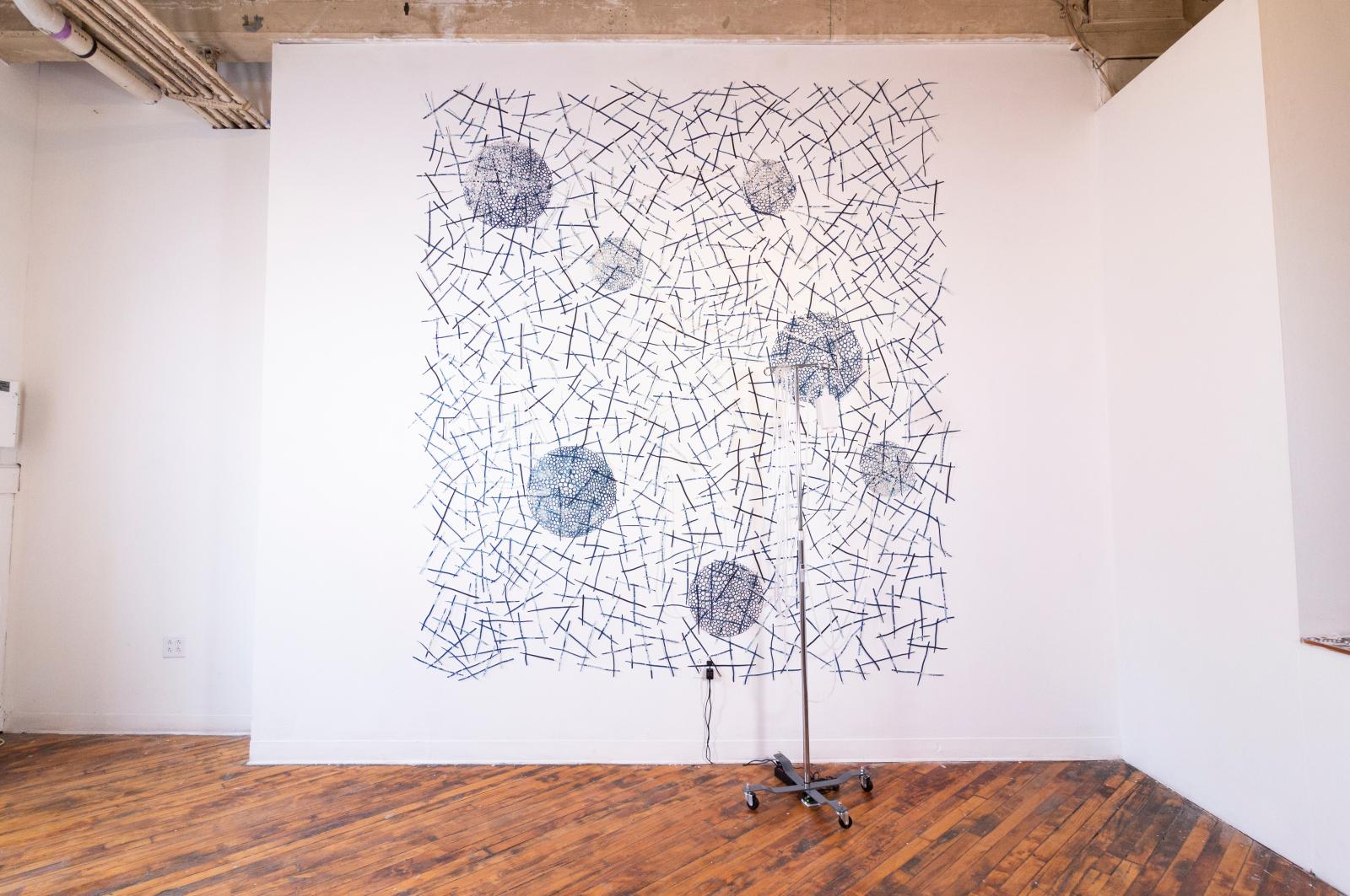 ebb and flow is an active wall installation that utilizes the materiality of water, a symbol of healing, to build imagery resembling veins, cells, and pathways found throughout the body. Dimensions vary depending on allotted space.