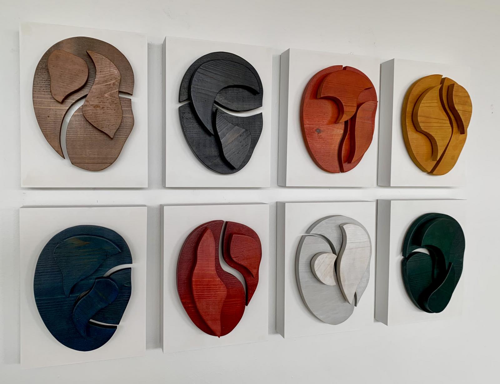 “Eight Masks” explores the concept of the “archetype” and its relationship with the natural world. The individual panels that make up the whole of the piece, each representing a unique expression or mood, are united through the harmony of color. The eight “archetypal” colors employed serve to explore the boundless interpretation of our conscious and subconscious selves, and how our feelings and emotions connect to the natural world.