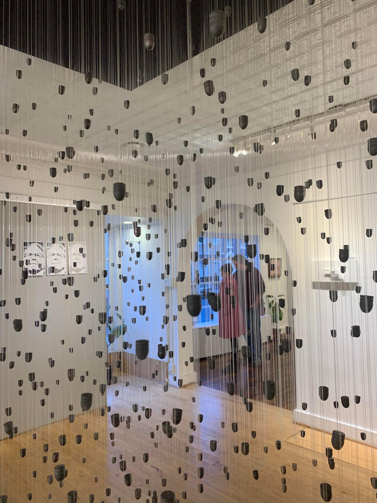 Installation piece from "under the influence" comprised of 1,152 hand-cast lead bullets. Each bullet is suspended by a monofilament and suspended from the ceiling. The installation speaks to the gun culture in our Country and the number of bullets approximates the number fired during the Las Vegas mass shooting.