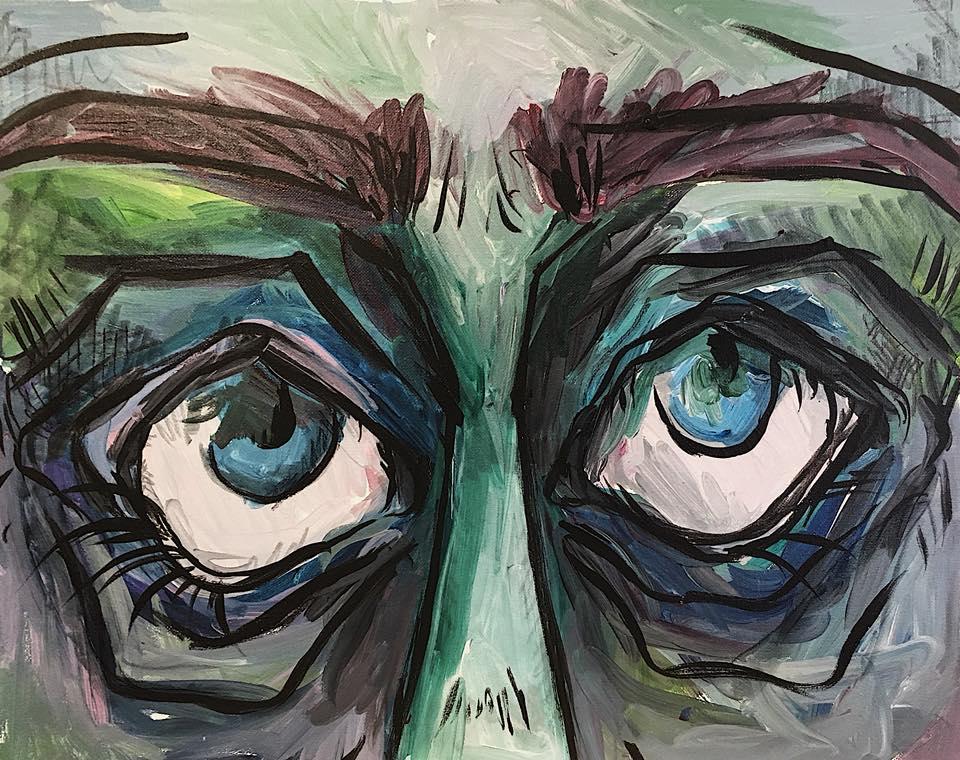 Eyes of a merman painted on stretched canvas