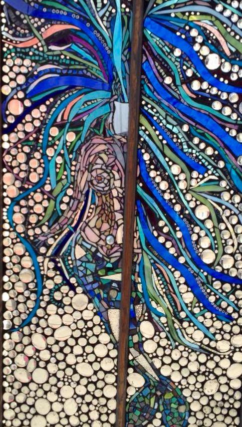 Mosaic mermaid using stained glass and glass gems on vintage window