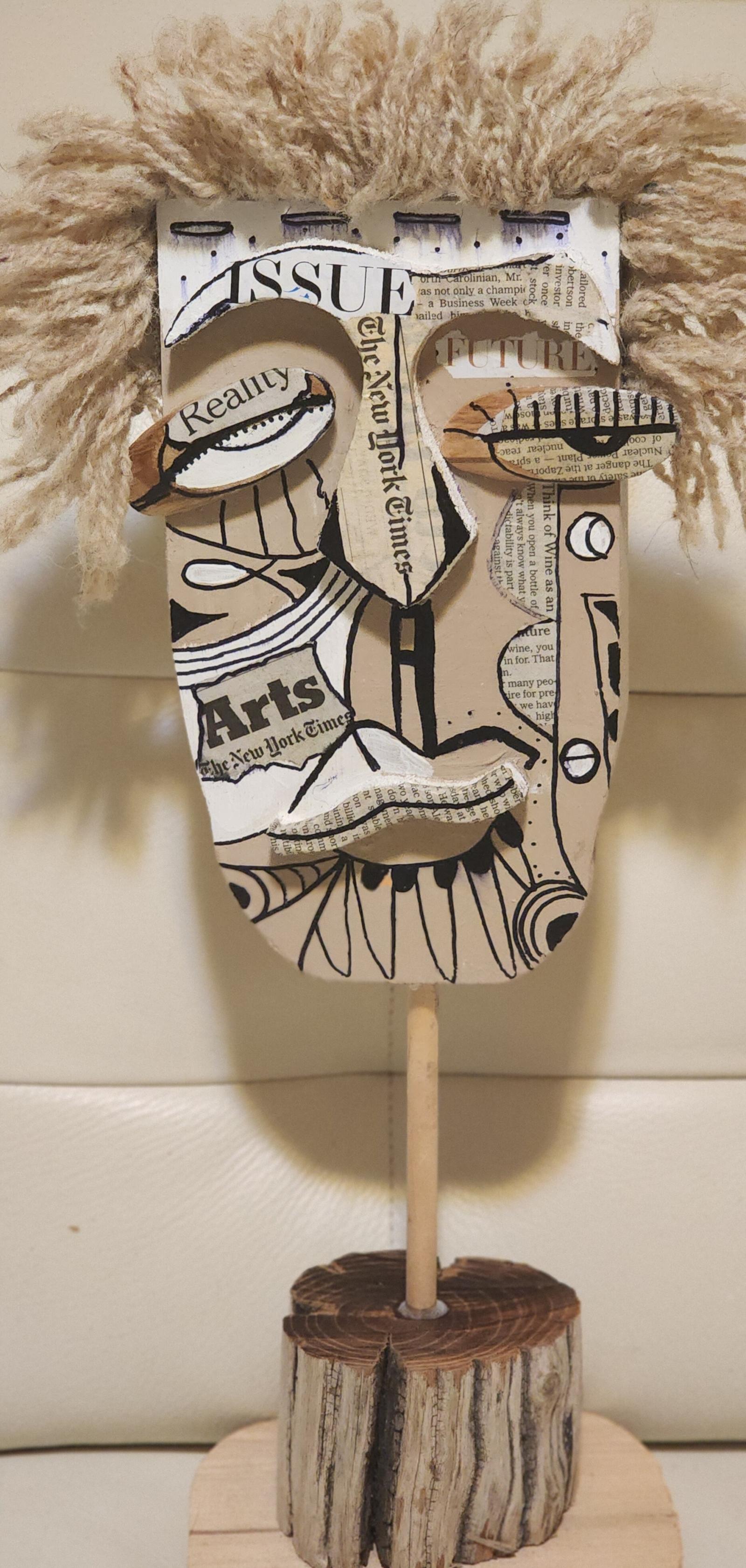 Wood/ sculpture/ newsprint/ acrylic/ found objects