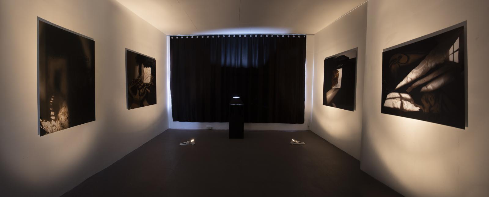 Cannon’s works capture her emotional and physical experience while making the work during both a pandemic and the death of her father. The original images were created as a cathartic exercise and a hope that artmaking would save her from the sense of being trapped. The current installation with printed large-scale photographs and video highlights our own intrusion into Cannon’s intimate dreamscape, an innermost nightmare being contained and viewed.
Excavation is an accompanying stop motion video, made with multiple materials and photoshop layers to create an entranceway into the spaces the photographs inhabit. These photographs question the reality of experiences, both personal and public. An extensive commentary on our deep psychological and cultural connection to voyeurism, Caving In to Disturbed Beauty presents a space of both horror and fascination where we are meant to question our role in viewing intimate and emotional spaces.